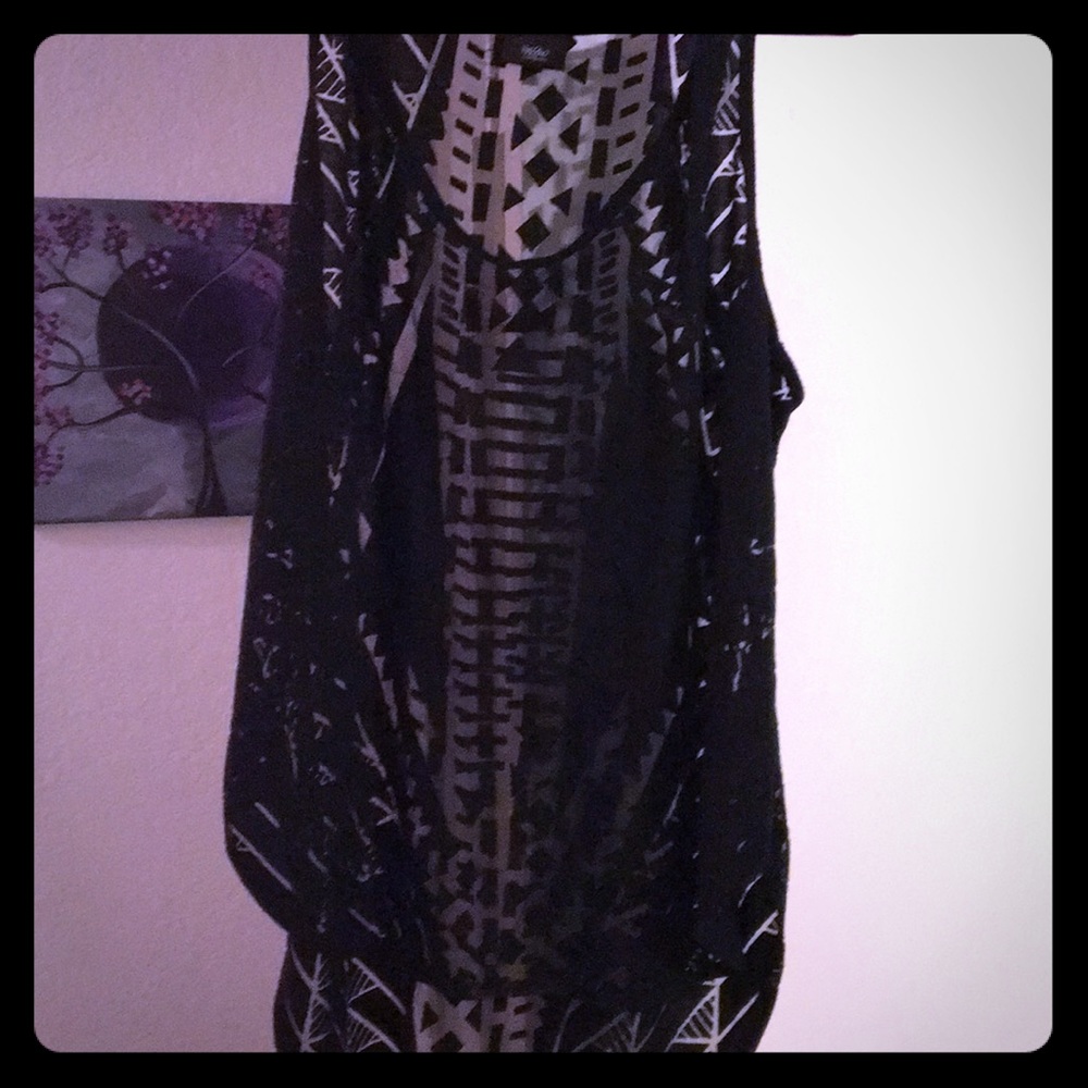 Sheer tank top. So cute!